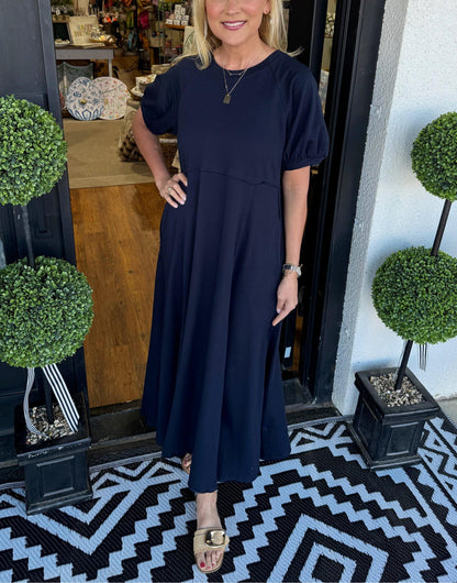 Senna | Vestido maxi chic con mangas abullonadas y cuello redondo