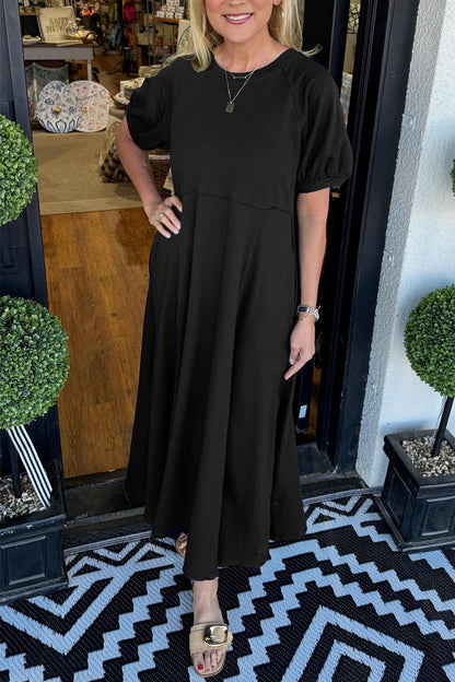 Senna | Vestido maxi chic con mangas abullonadas y cuello redondo